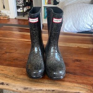 Black sparkle hunter boots.
